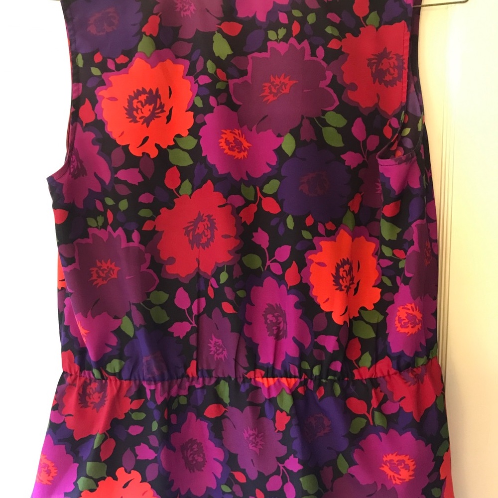 Peplum bold floral print top